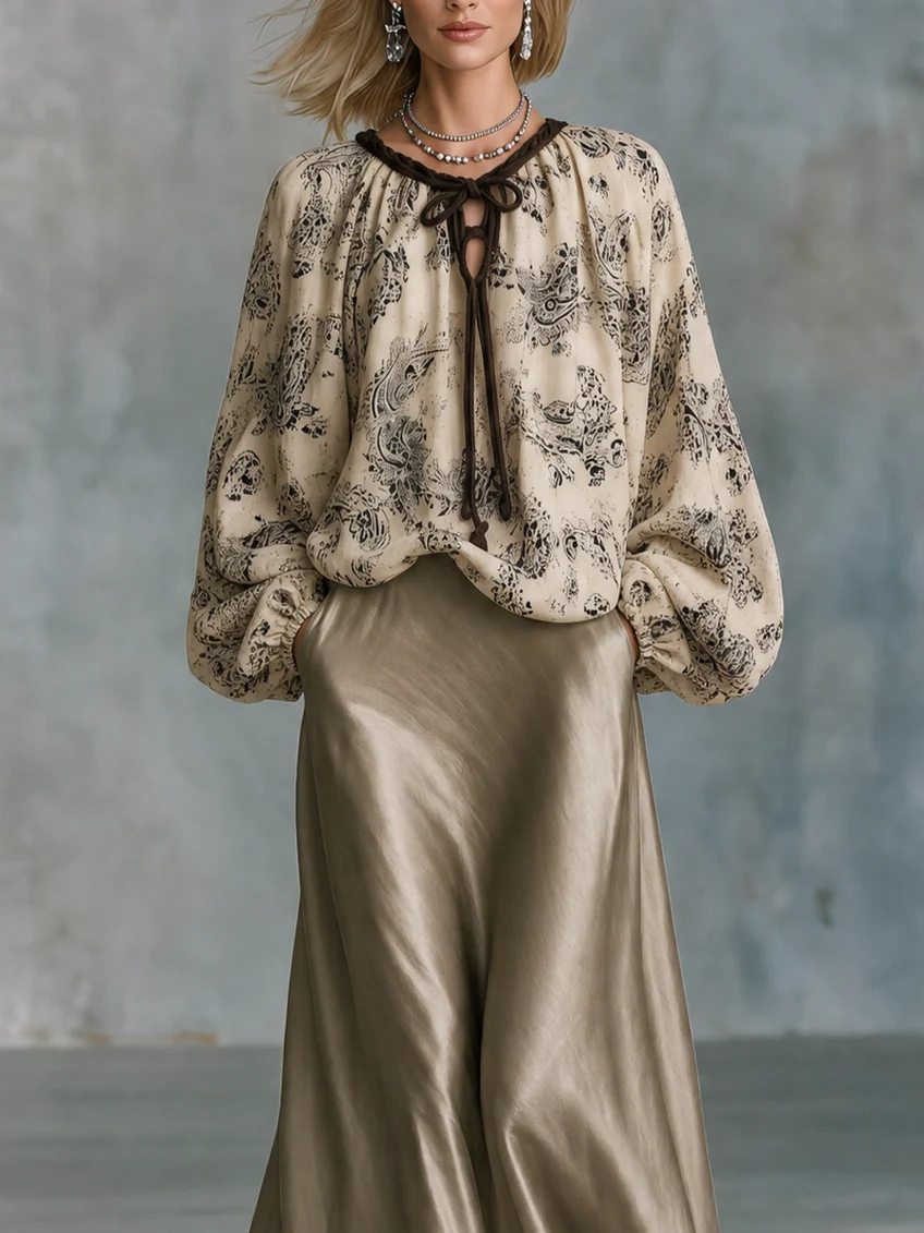 Conjunto Beige: Top Cruzado Estampado Paisley con Mangas Farol y Falda de Encaje Satinado Champán