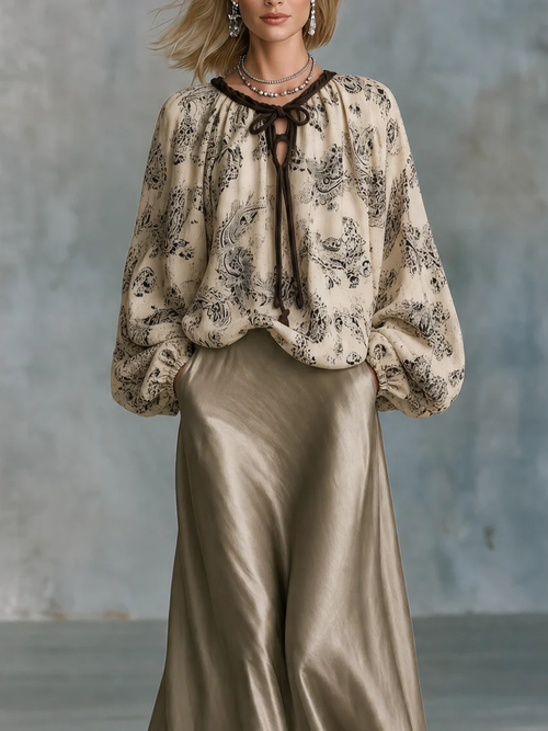Conjunto Beige: Top Cruzado Estampado Paisley con Mangas Farol y Falda de Encaje Satinado Champán